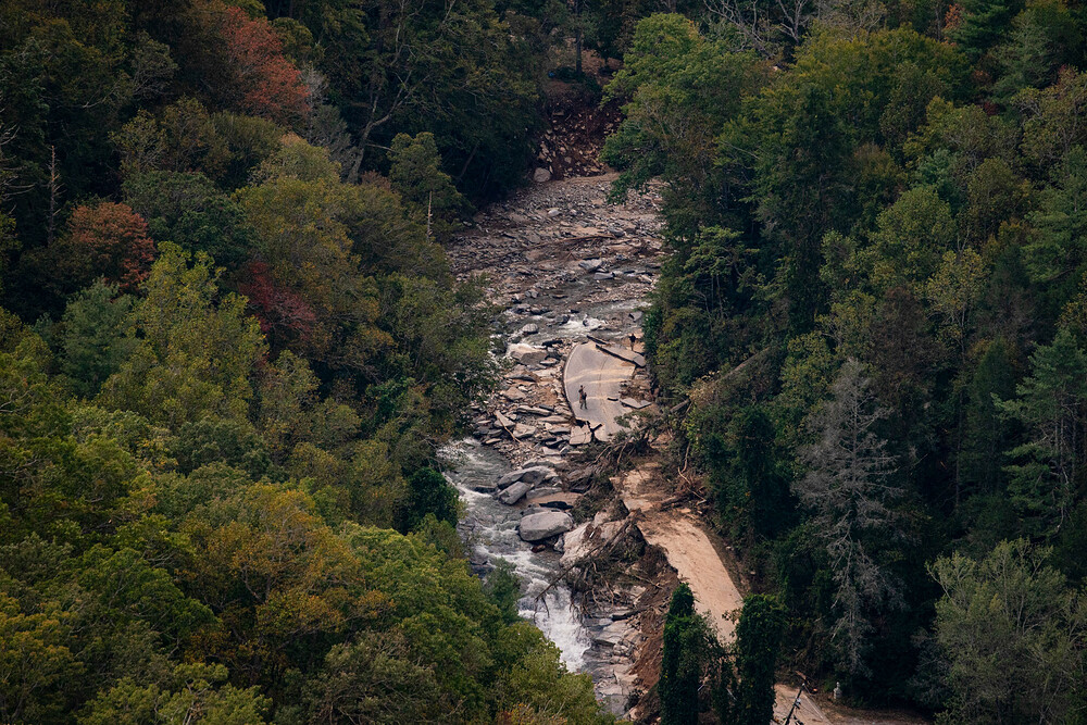 A road with damage from Hurricane Helene near Asheville, N.C., on Wednesday, Oct. 2, 2024. (Al Drago/The New York Times) A road with damage from Hurricane Helene near Asheville, N.C., on Wednesday, Oct. 2, 2024. (Al Drago/The New York Times)