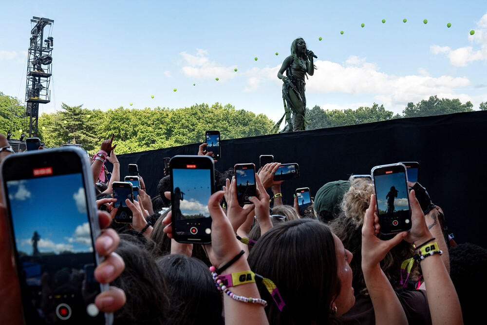 Revelers watch performances at the Governors Ball music festival Revelers watch performances at the Governors Ball music festival