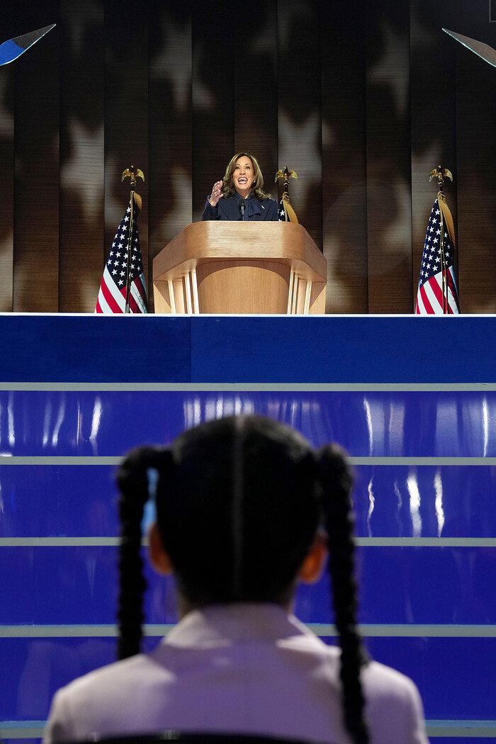 Amara Ajagu watches as Vice President Kamala Harris, the Democratic presidential nominee, speaks on the fourth day of the Democratic National Convention at the United Center in Chicago, on Thursday, Aug. 22, 2024. (Todd Heisler/The New York Times) Amara Ajagu watches as Vice President Kamala Harris, the Democratic presidential nominee, speaks on the fourth day of the Democratic National Convention at the United Center in Chicago, on Thursday, Aug. 22, 2024. (Todd Heisler/The New York Times)